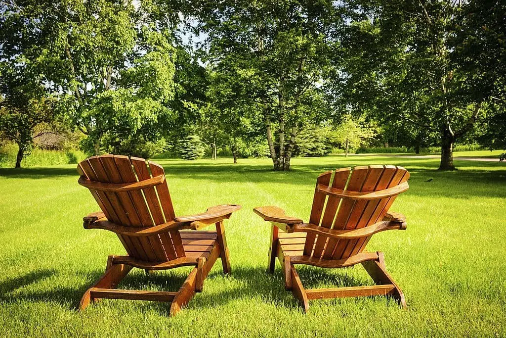 Backyard Oasis With Adirondack Chairs