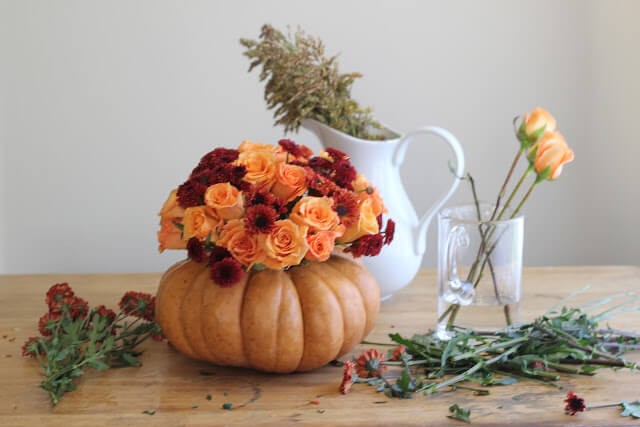 Roses, Mums & Broom Cob in a Pumpkin Vase