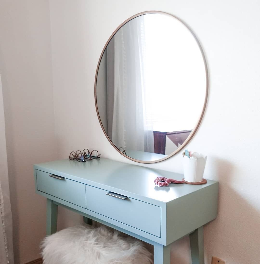 Boho bedroom with oval mirror