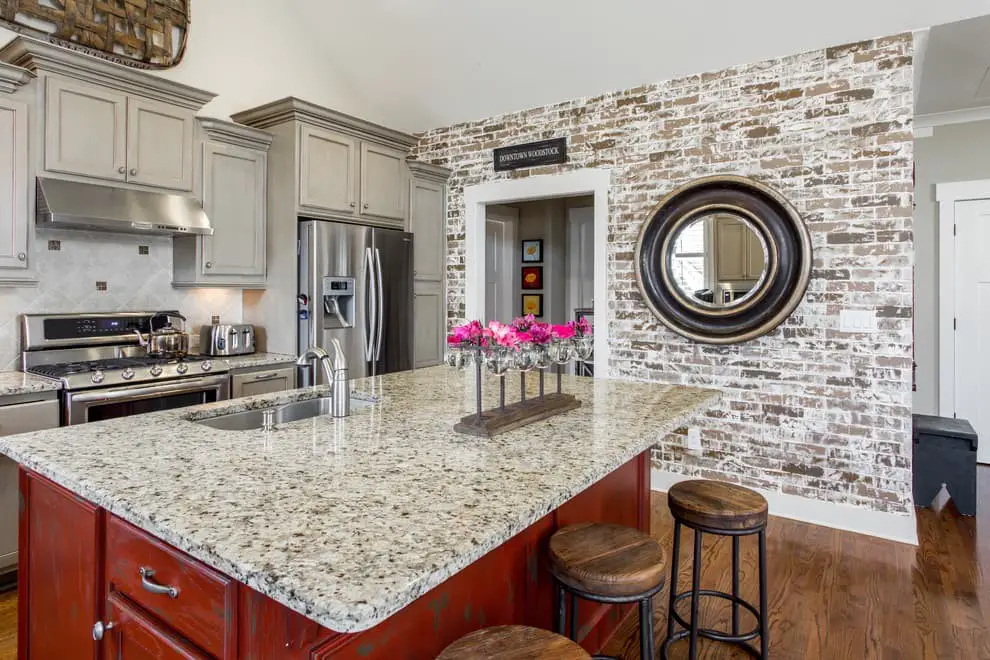 Kitchen ideas with brick accent wall.