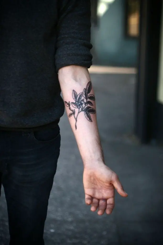 #5. The fore-arm olive branch tattoo.