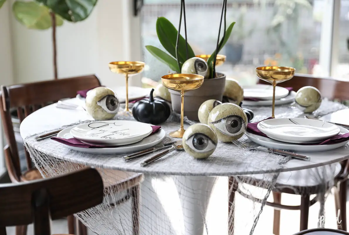 Wicked and eclectic Halloween table setting