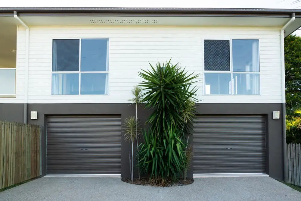 Garage with upstairs home