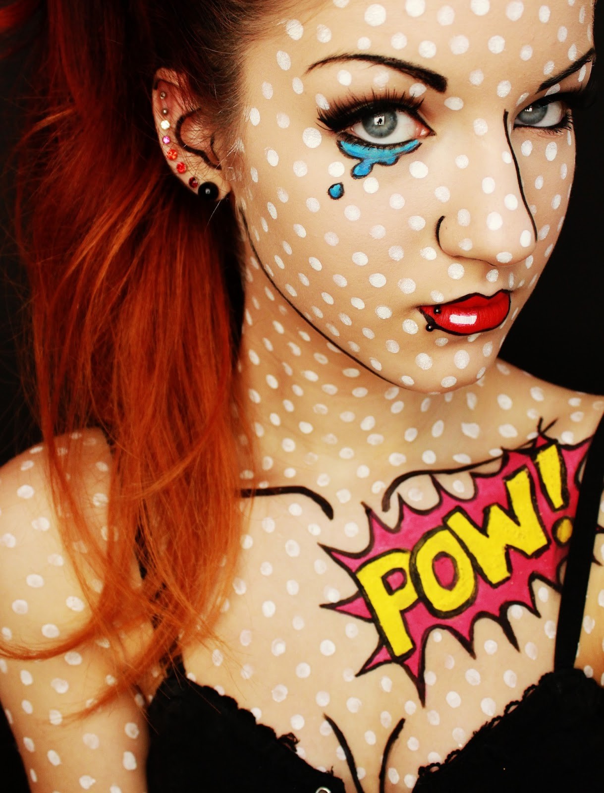 Girl with makeup for halloween as pop art