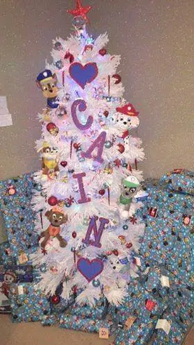 #5. PAW Patrol Themed Christmas Tree With Presents Wrapped In PAW Patrol Paper