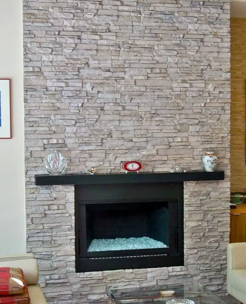 Faux stone fireplace ideas.