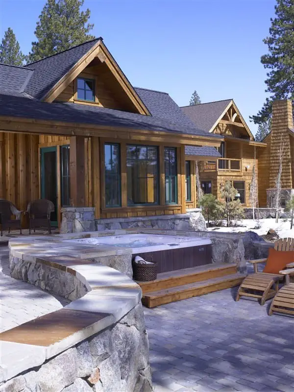 Hot tub deck on a stone surround