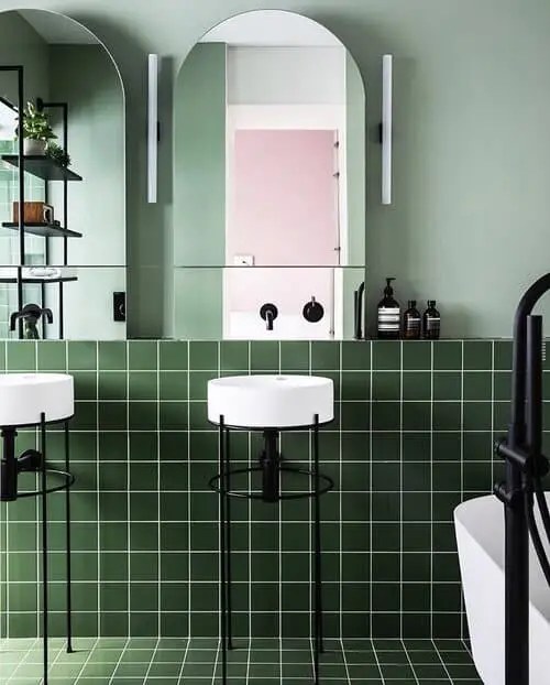 Green tile wainscot bathroom wall