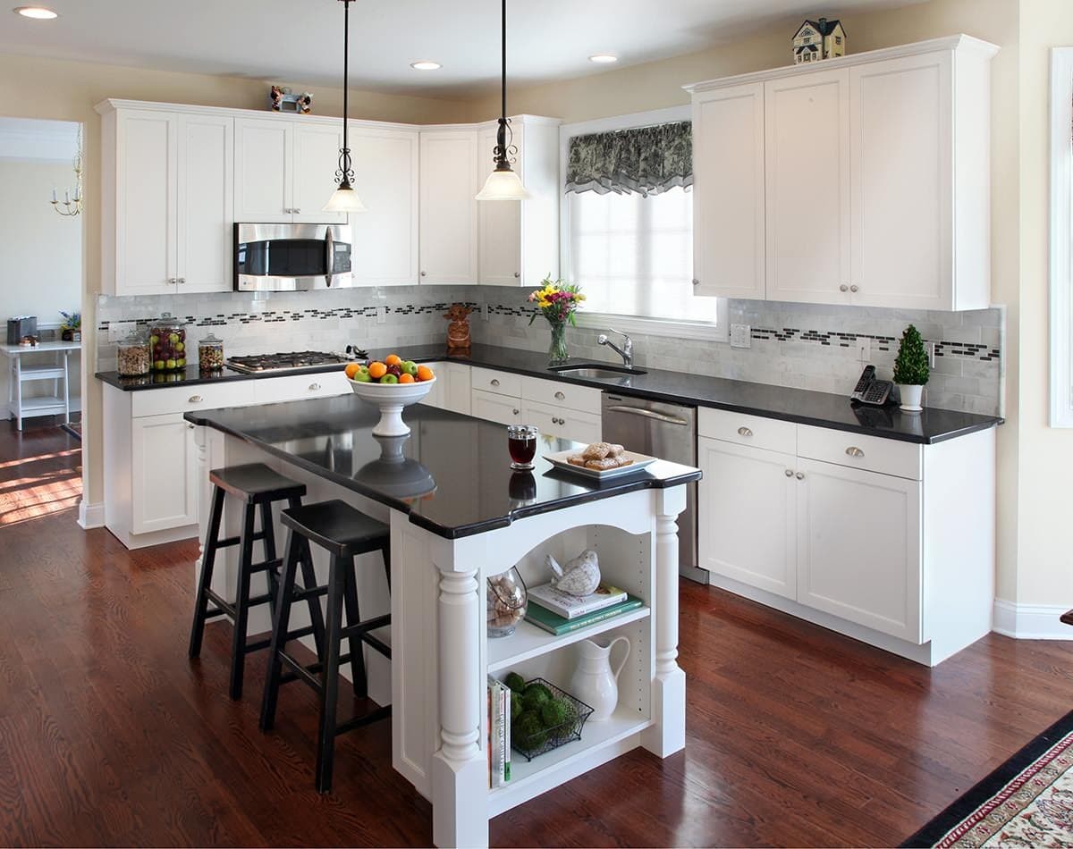 Backsplash ideas for white cabinets and dark granite countertops.