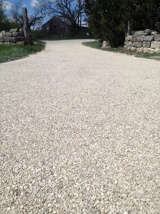 3-4. Long, tar and chip driveway