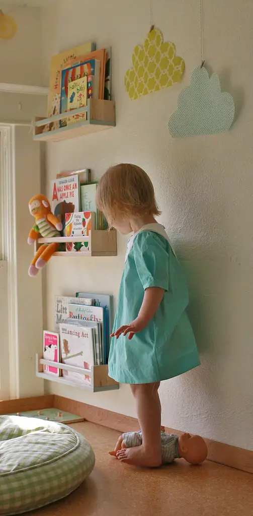 Use a spice rack to create a small bookcase for children