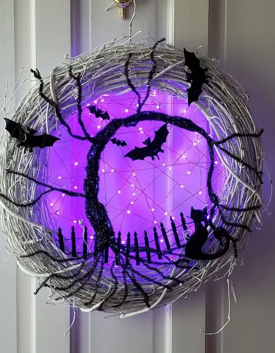 #9. Halloween tree with cat, bats, fence lighted wreath