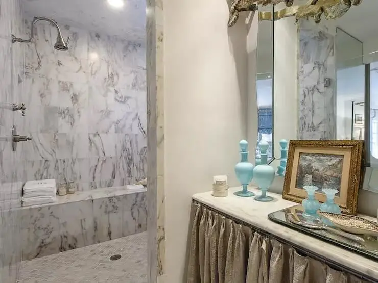 Marble doorless basement bathroom