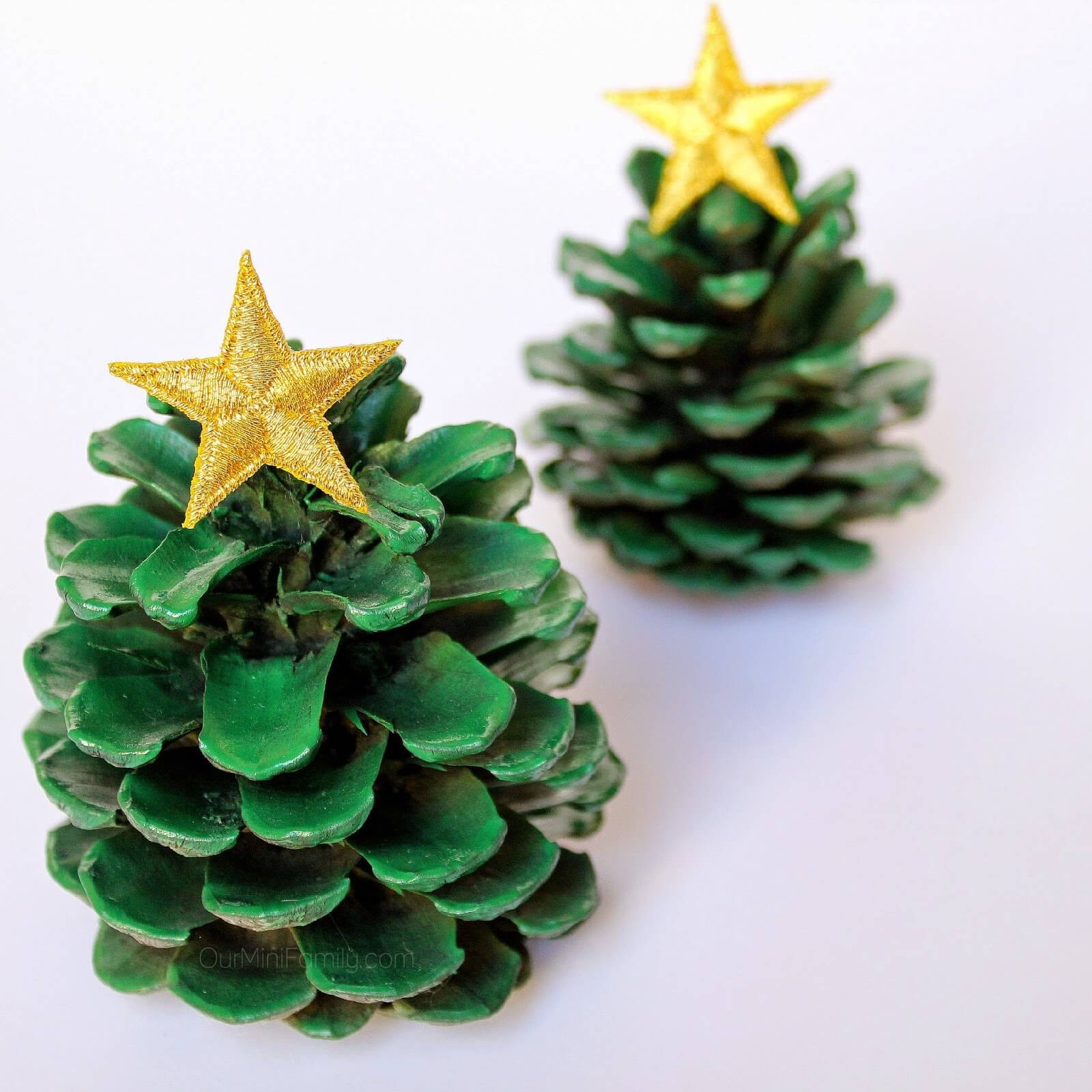 #3. Pinecone Christmas Trees by ourminifamily