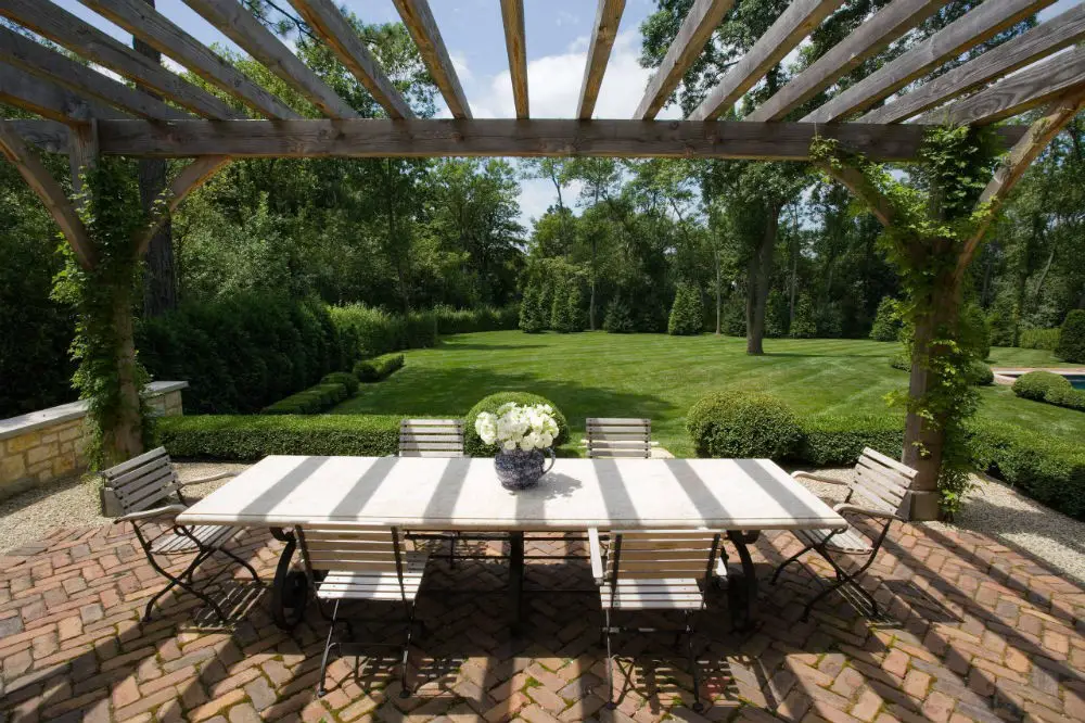 #23. Wooden Backyard Pavilion with a Brick Paver Patio