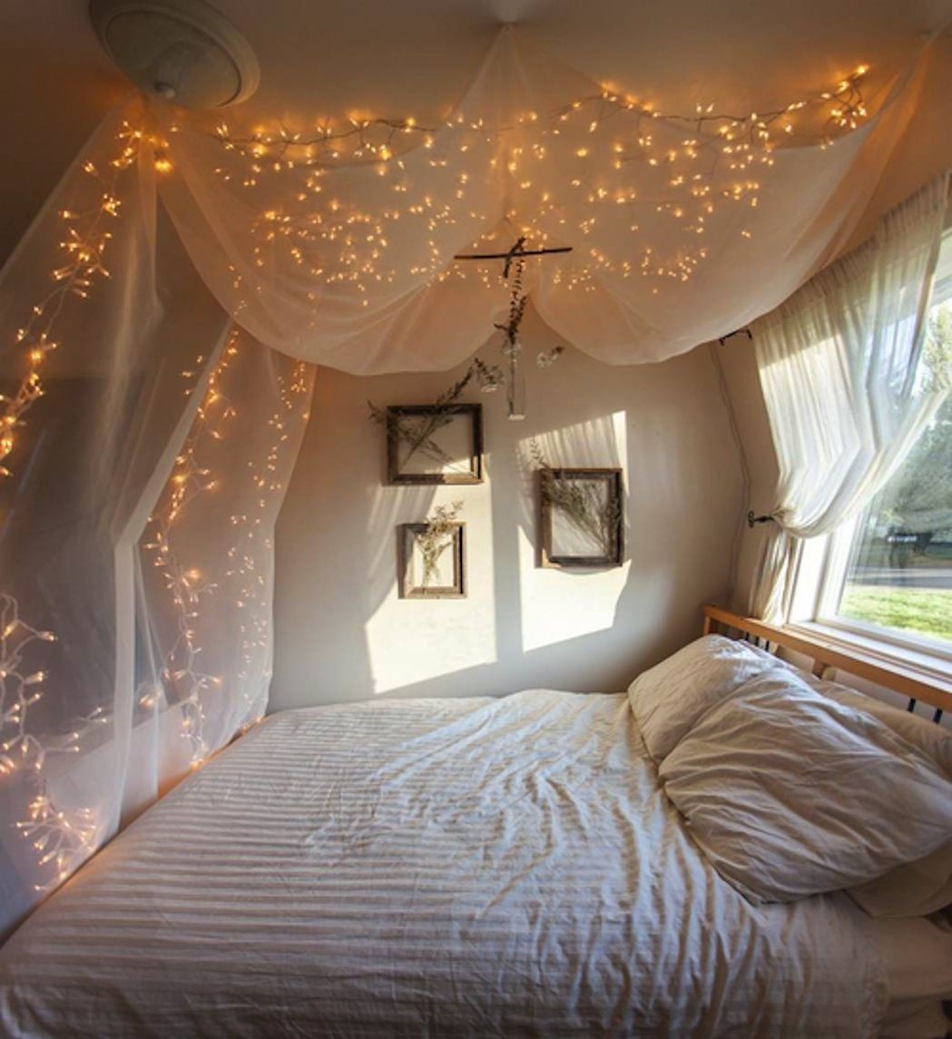 #9. DIY Canopy Bed with Fairy Light