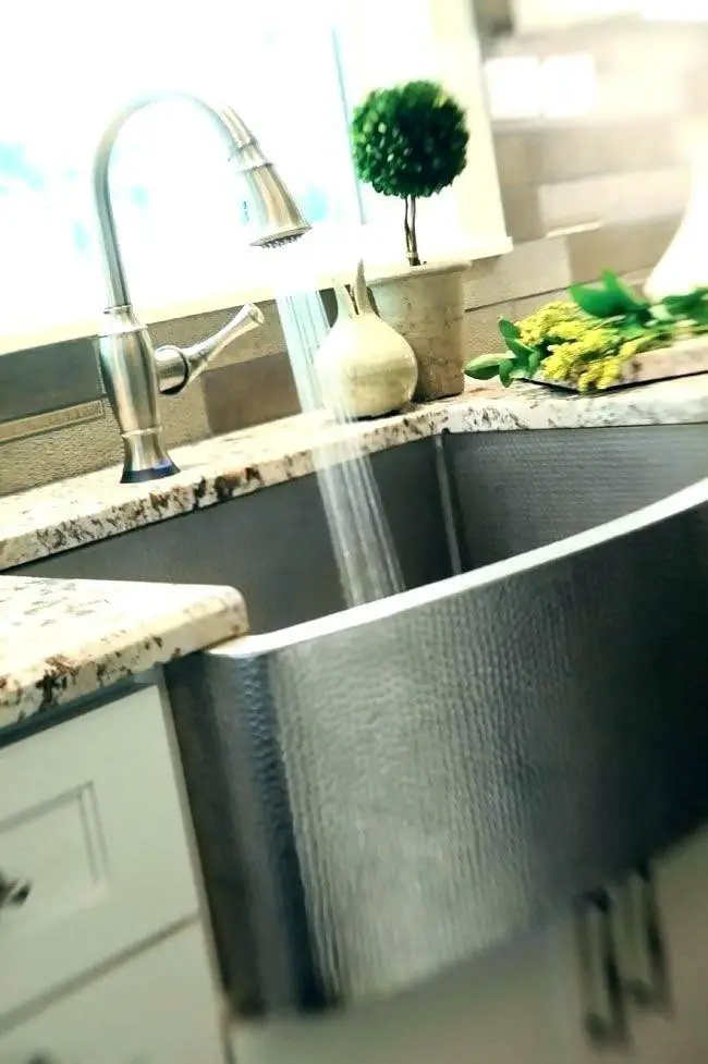 #7. Grey stone farmhouse sink