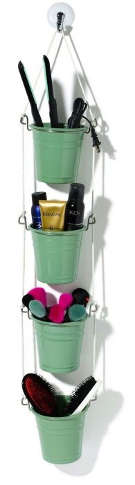 A rope, hooks and some metal pots are a useful way to store your beauty accessories