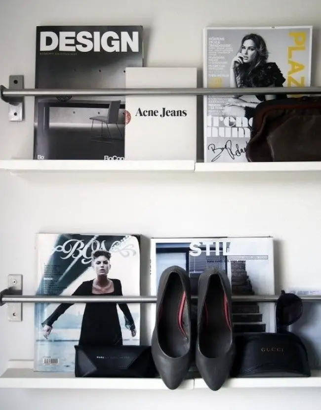 Create shelves with rails and pieces of wood to make your magazines and books look elegant