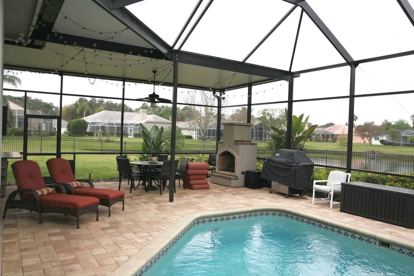 Enclosed patio with a pool