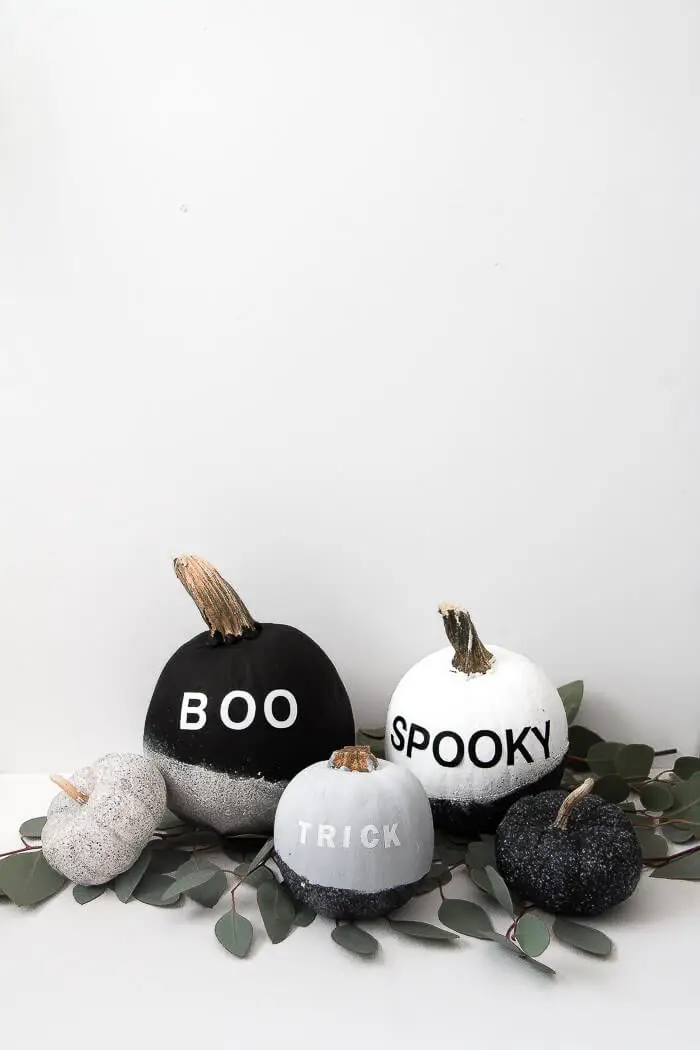 Easy DIY Modern Painted Pumpkins using spray paint and vinyl stickers