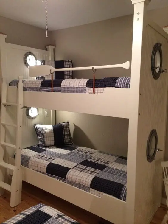 Lightly lit white bunk beds