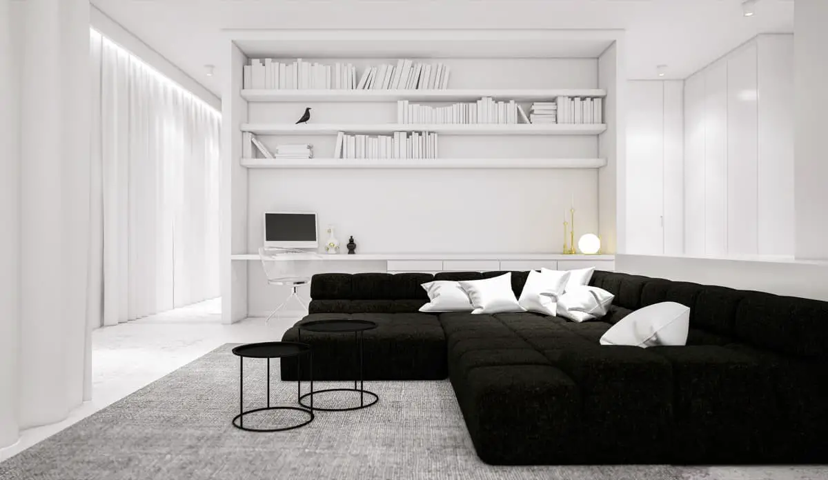 A crisp white wall against your black sofa