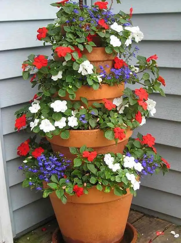 Tower Of Potted Red, White, And Blue