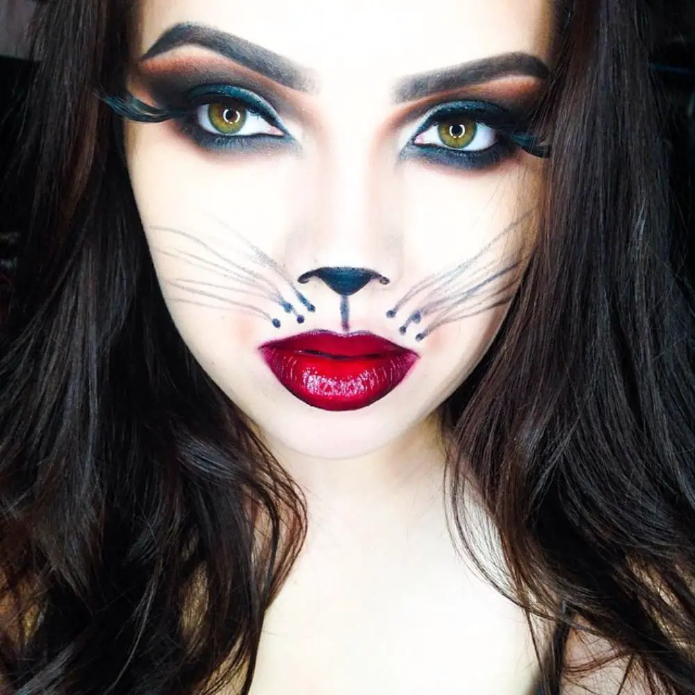 Girl with makeup for cat halloween