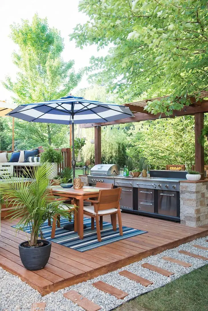 Floating deck with outdoor kitchen