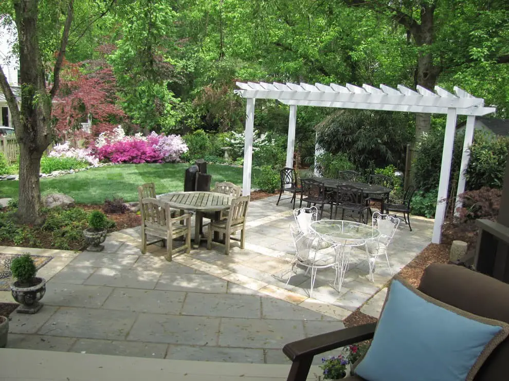 Flagstone patio ideas with pergola.