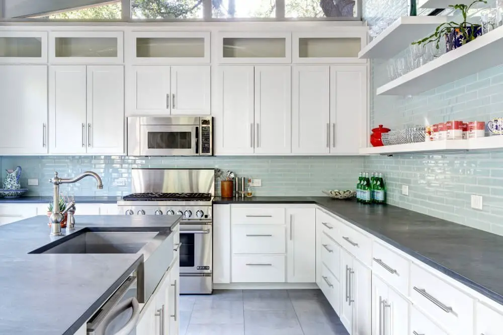 Backsplash ideas for white cabinets and dark granite countertops.