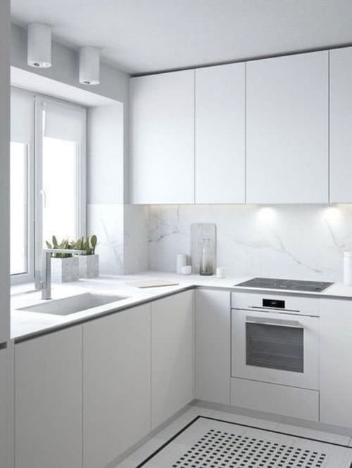 Monochrome white appliances +White cabinets.