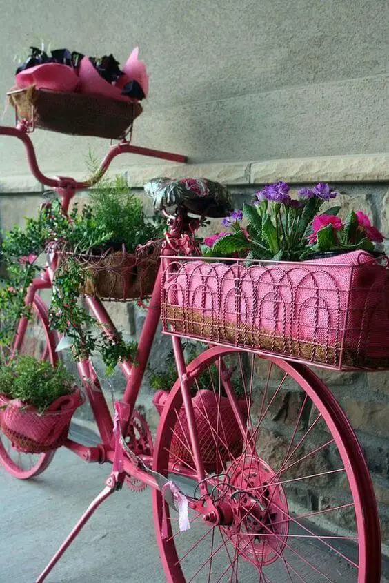 Bike turned flower planter