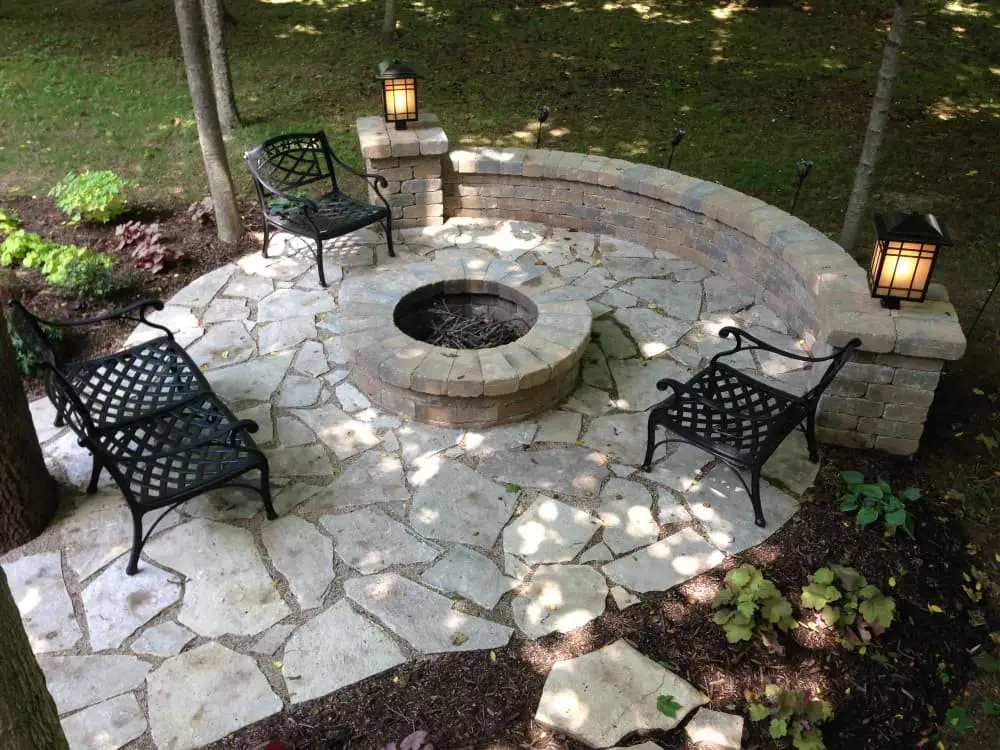 Flagstone patio ideas with a fire pit.