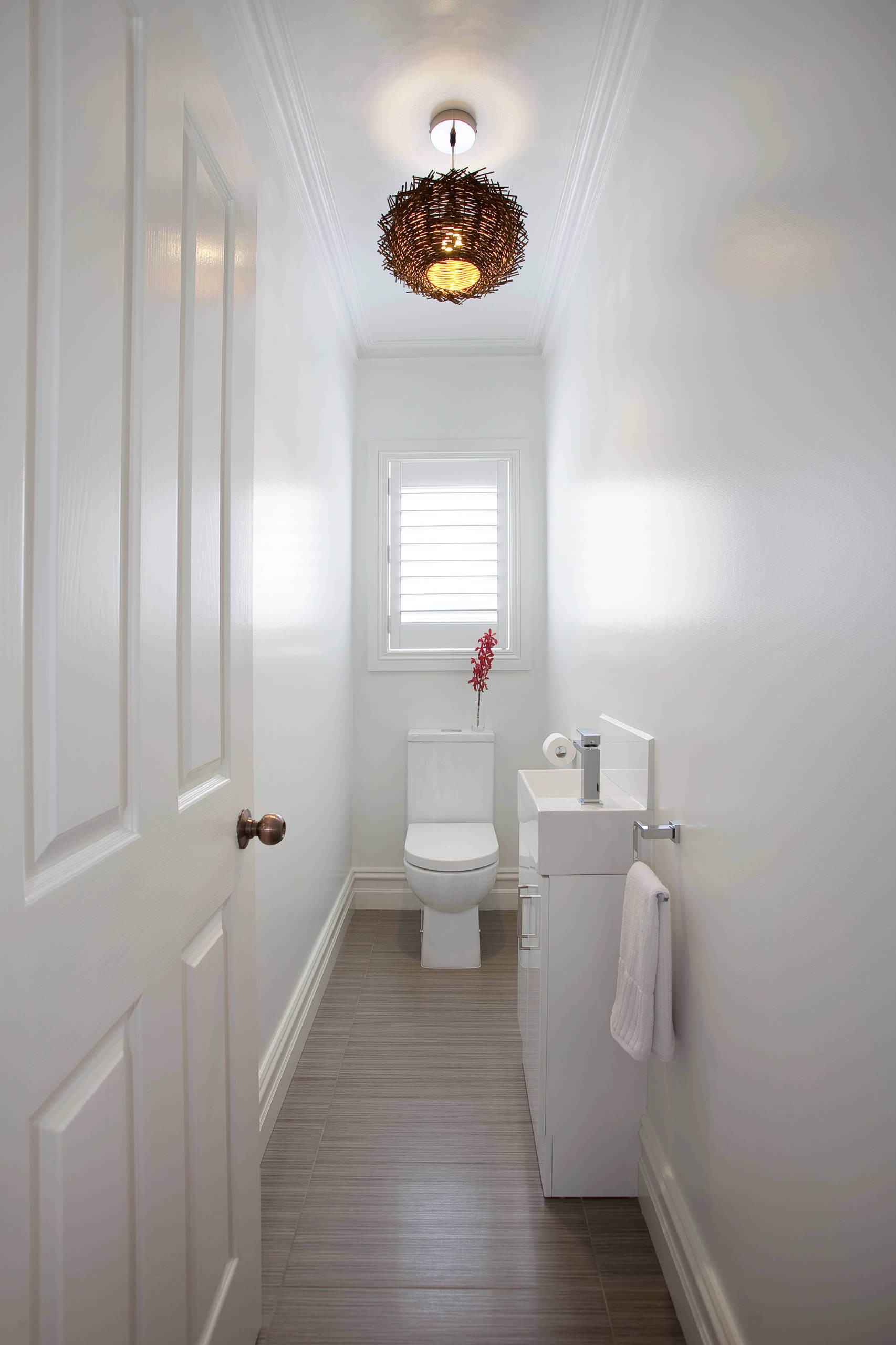 #7. Contemporary powder room remodel in Melbourne