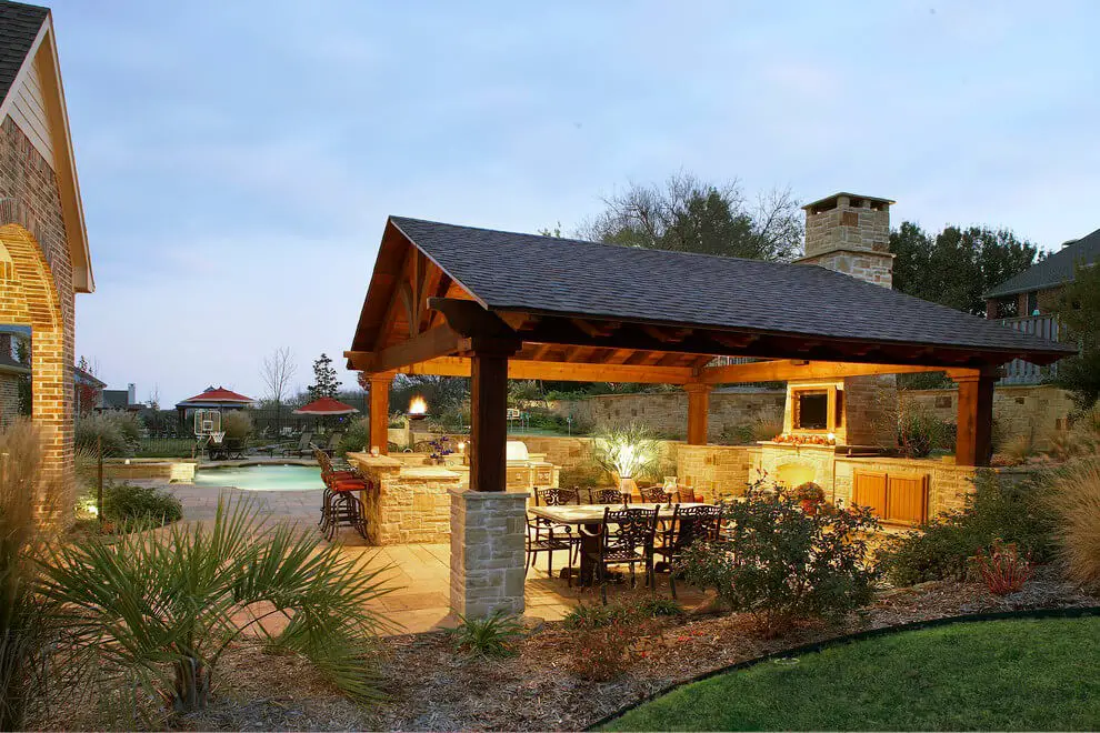 #23. Wooden Backyard Pavilion with a Brick Paver Patio