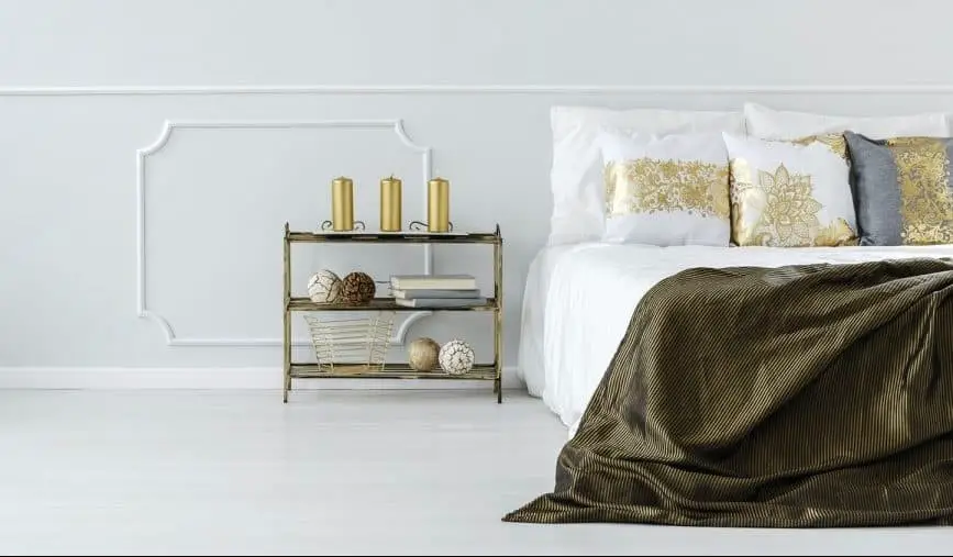 Bohemian themed gold and white bedroom