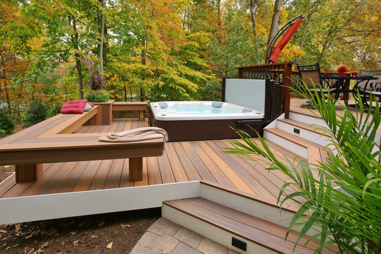 Multi-functional hot tub bed on a deck