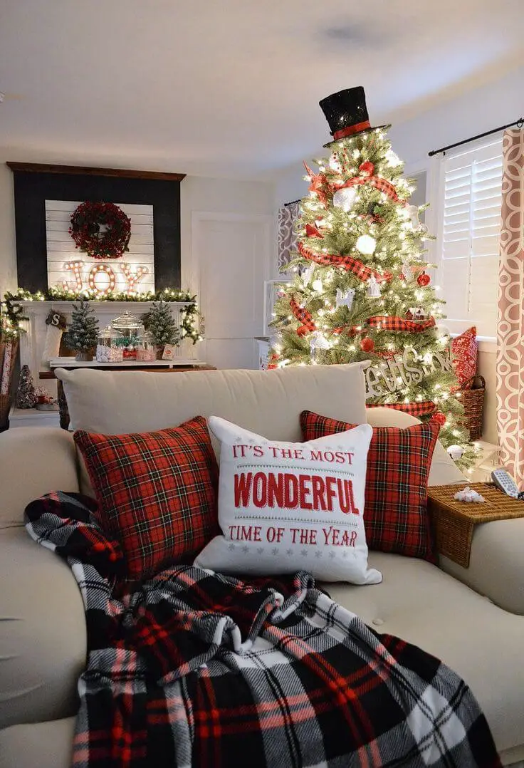 Evergreen Christmas tree with silver and gold ornaments