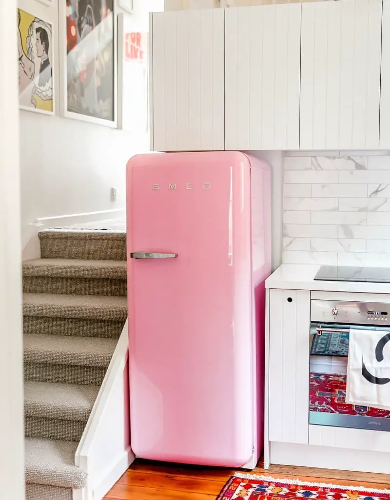 Pink appliances + White cabinets.